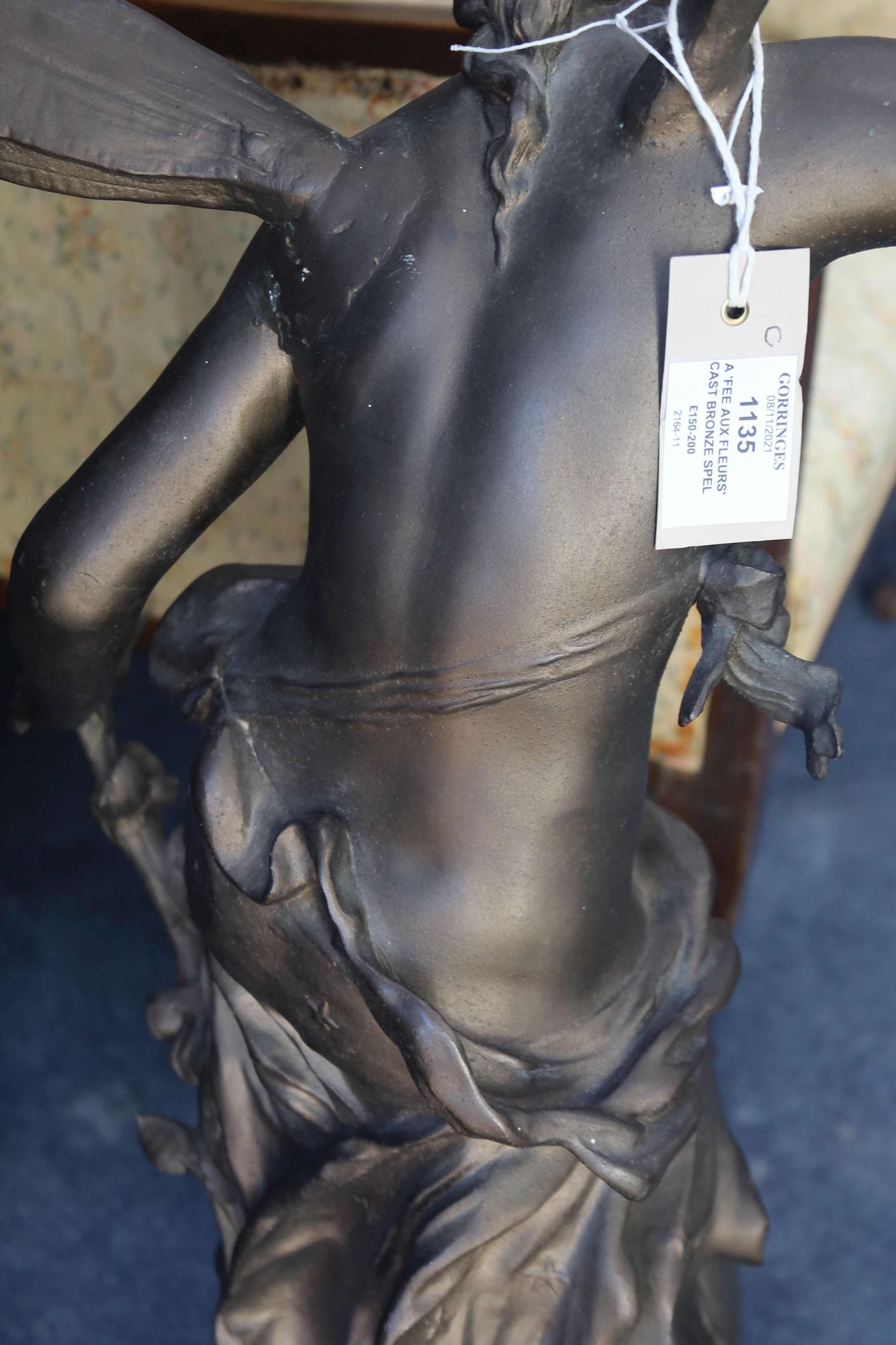 A 'Fee Aux Fleurs' cast bronze spelter fairy statue on marble base, height 90cm